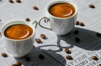 2 cups of espresso with coffee beans 