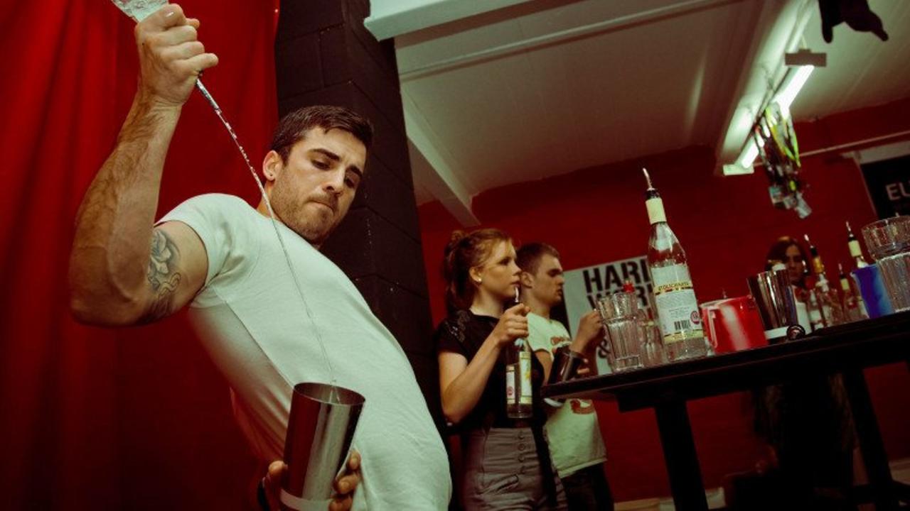 Skilled bartender preparing a cocktail