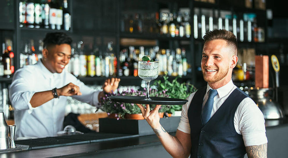 bartender tray smiling 